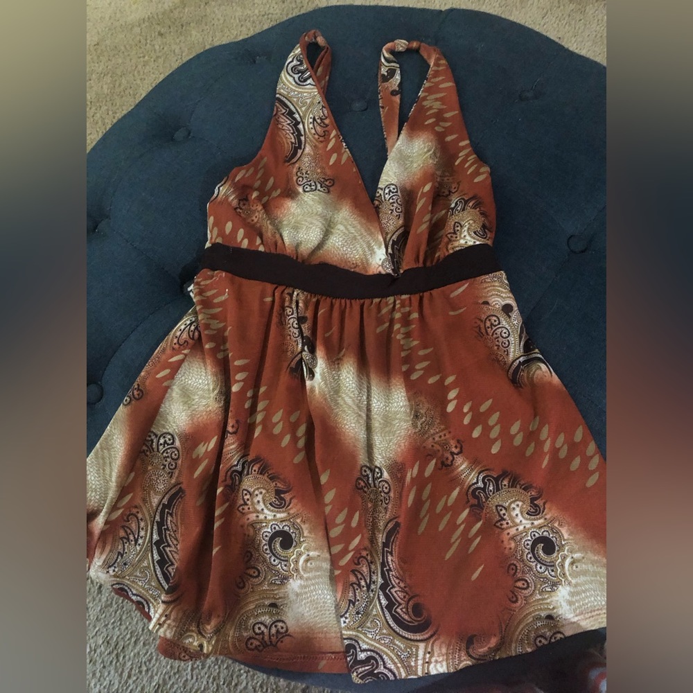 Top with straps. Beautiful burnt orange and tan